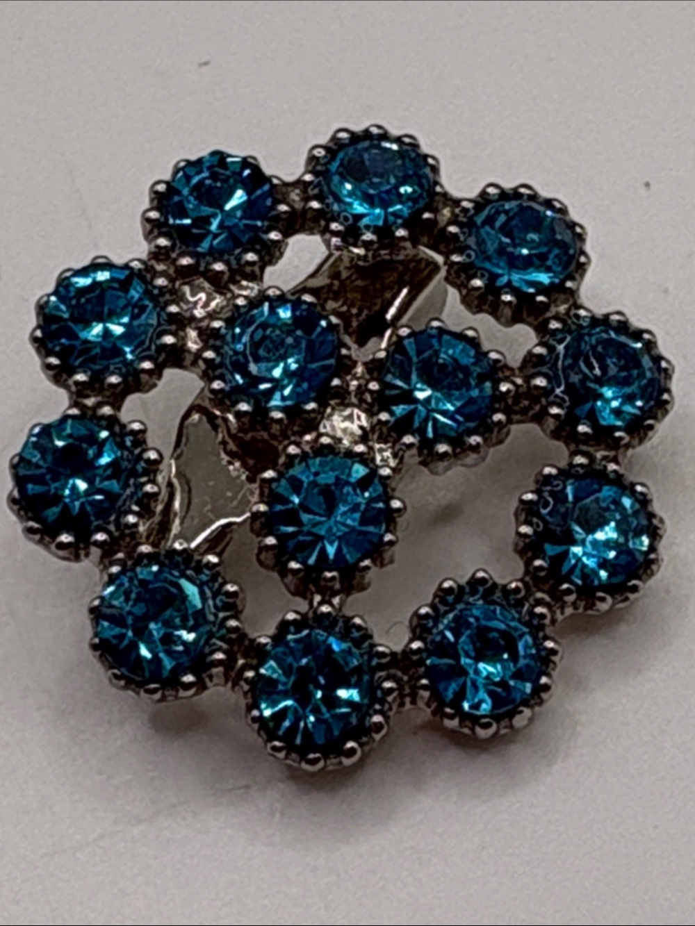 Blue Crystal Round Floral Brooch - Silver Tone Accent